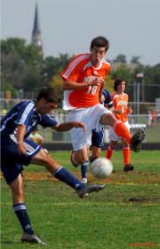 Augie battles for possession