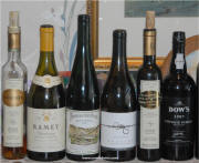 Wine tasting flight of Ramey, Phelps Ovations chardonnays, Bernkasterl Doctor, Kracher #5 & 8 and Dow Vintage Port.